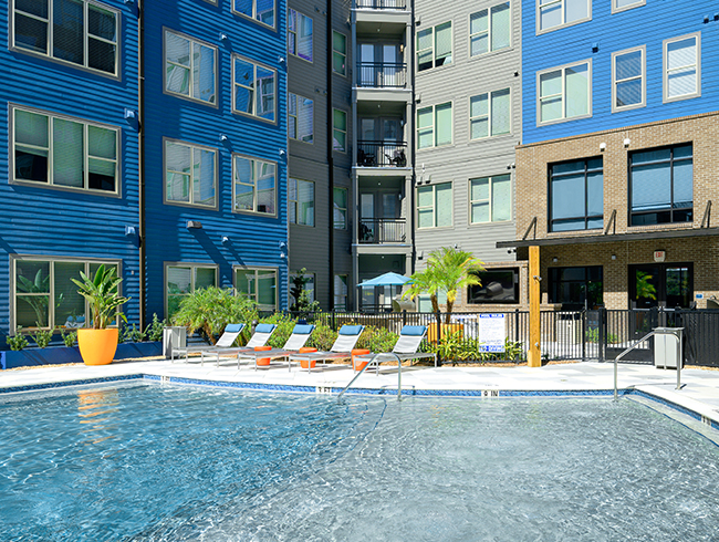 A swimming pool in an apartment complex.